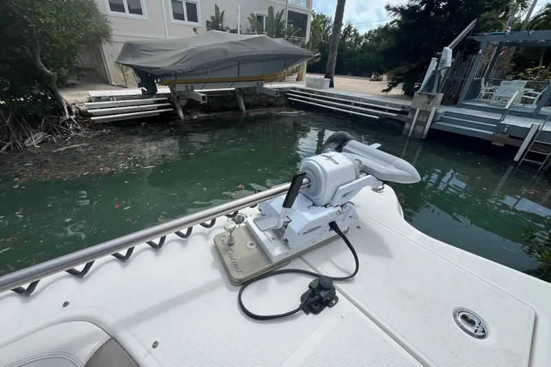 Slide: The Image of Bow of a 2020 World Cat 296 DC boat with a mounted anchor winch. - 10