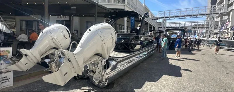 Slide: The Image of Veranda V One Series Twin Engine 2025 at a boat show. - 3