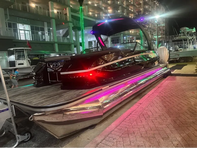 Slide: The Image of 2025 Veranda V One Series Twin Engine illuminated at night. - 5