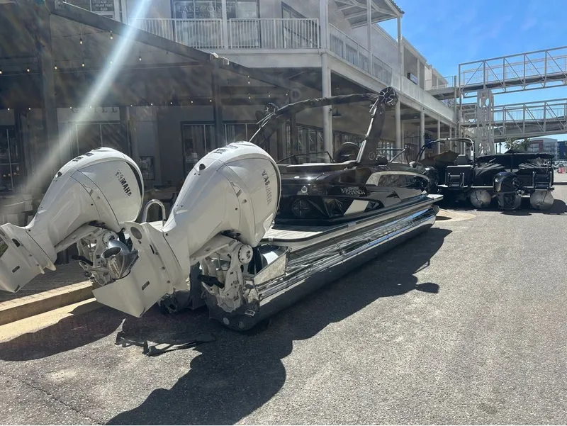 Slide: The Image of 2025 Veranda V One Series Twin Engine boat parked outdoors. - 7