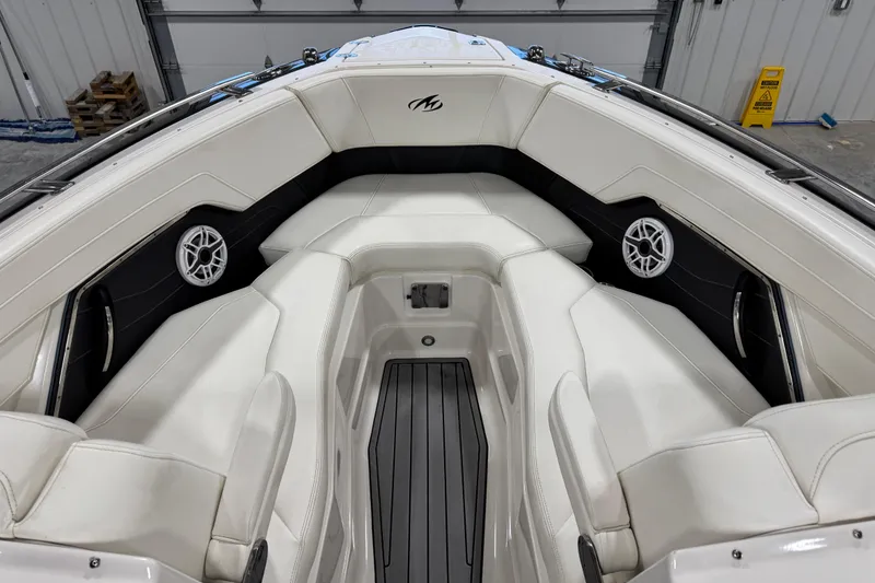 Slide: The Image of Interior of 2014 Monterey 268SS Super Sport boat with white seating and speakers. - 14
