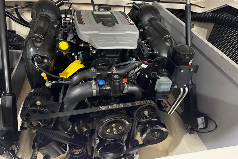 Slide: The Image of Engine of 2014 Monterey 268SS Super Sport boat, showcasing detailed components. - 16