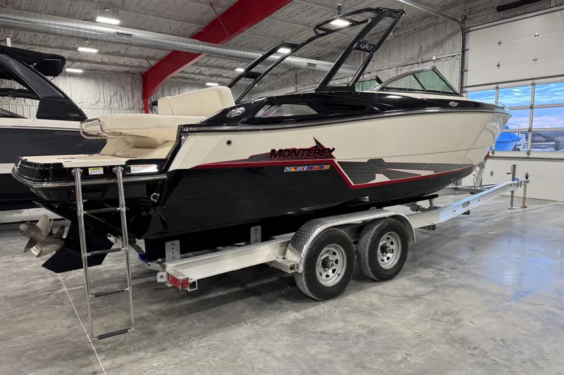 Slide: The Image of 2014 Monterey 268SS Super Sport boat on trailer in indoor storage facility. - 3