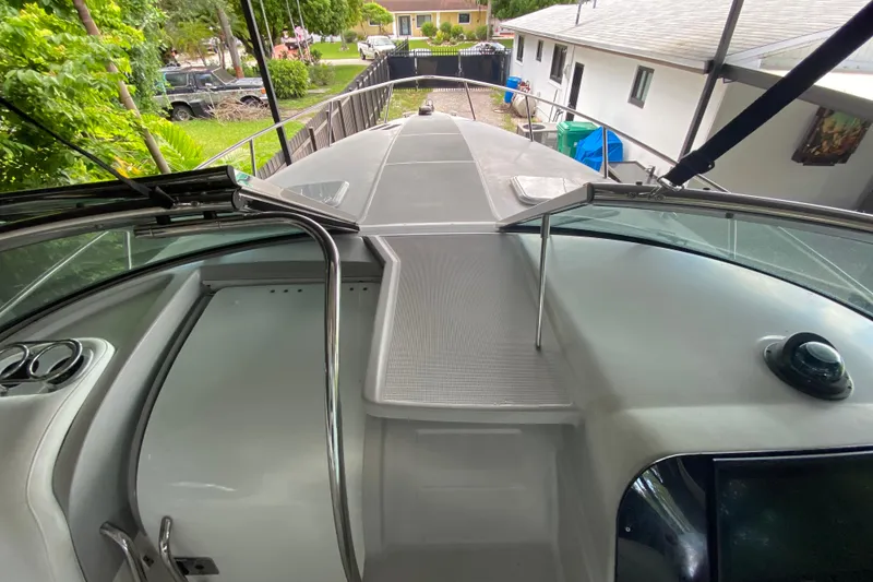 Slide: The Image of 2005 Formula 330 Sun Sport boat deck with sleek design and modern features. - 16