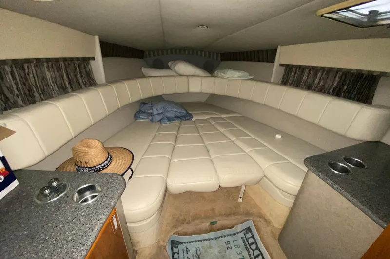 Slide: The Image of Interior cabin of a 2005 Formula 330 Sun Sport boat with beige seating. - 28