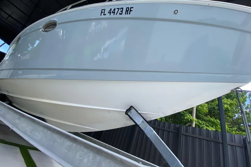 Slide: The Image of 2005 Formula 330 Sun Sport boat on trailer, side view with registration number. - 7