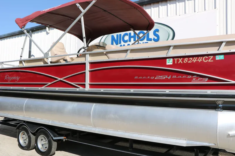 Slide: The Image of 2014 Sun Tracker Regency Party Barge 254 Xp3 pontoon boat with red canopy. - 15