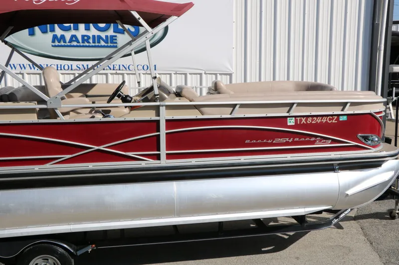 Slide: The Image of 2014 Sun Tracker Regency Party Barge 254 Xp3 pontoon boat side view. - 22