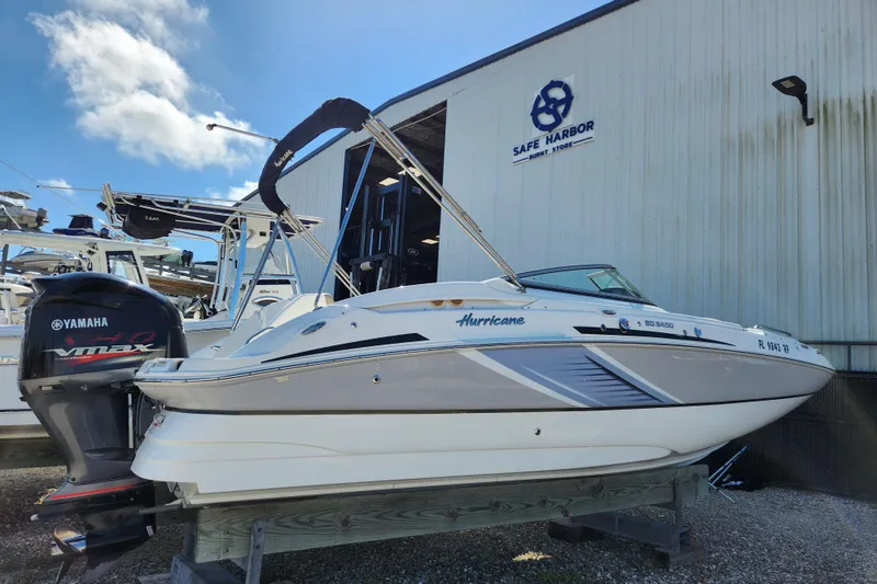 The Image of 2016 Hurricane SunDeck 2400 OB boat with Yamaha VMAX engine at Safe Harbor. - 0