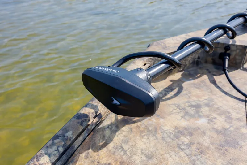 Slide: The Image of Trolling motor on Excel 203 Bay Pro Elite boat, 2026 model, in calm water. - 14