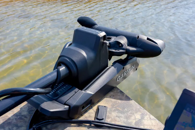 Slide: The Image of Garmin trolling motor on Excel 203 Bay Pro Elite boat, 2026 model, in clear water. - 15