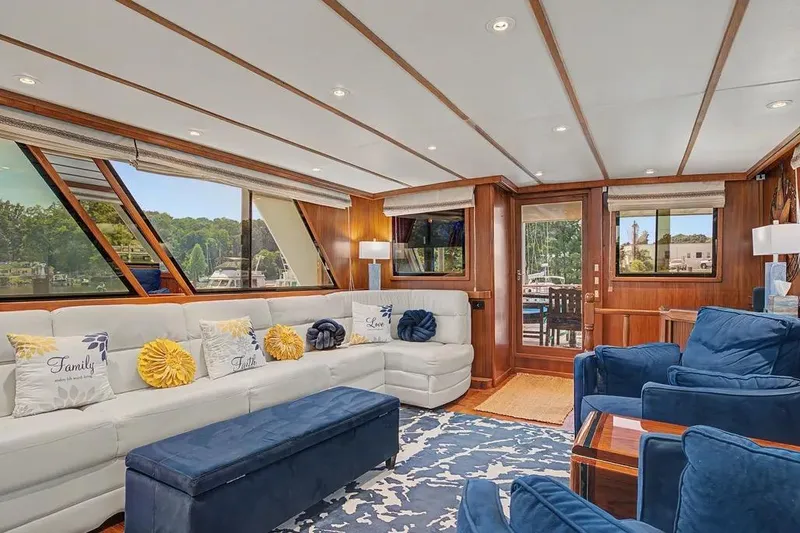 Slide: The Image of Luxurious interior of 1989 Jefferson Marquessa 63 yacht with elegant seating and decor. - 11