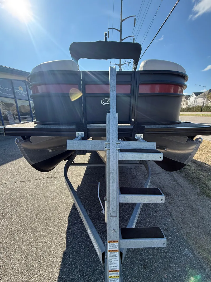 Slide: The Image of 2021 Barletta Corsa 23QCSS Coastal Edition on trailer, rear view. - 2