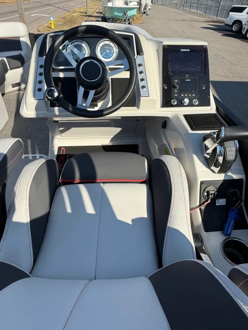 Slide: The Image of Interior view of 2021 Barletta Corsa 23QCSS Coastal Edition helm. - 7