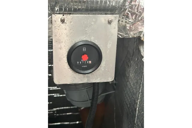 Slide: The Image of Hour meter on a 2007 Jeanneau Sun Odyssey 42 DS sailboat engine compartment. - 19
