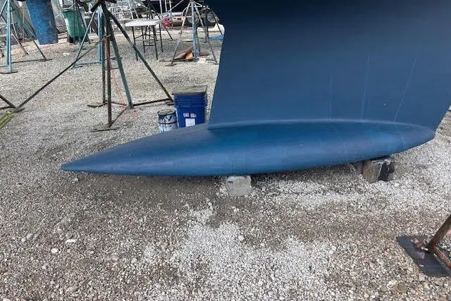 Slide: The Image of Keel of 2007 Jeanneau Sun Odyssey 42 DS sailboat on dry dock. - 21