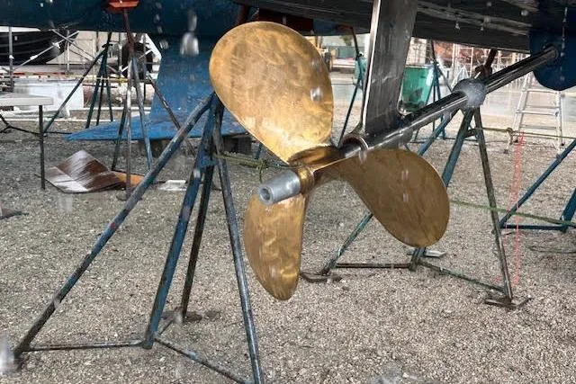 Slide: The Image of Propeller of 2007 Jeanneau Sun Odyssey 42 DS sailboat on dry dock. - 27