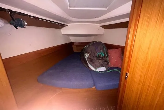 Slide: The Image of Cozy cabin interior of 2007 Jeanneau Sun Odyssey 42 DS sailboat with bedding. - 31