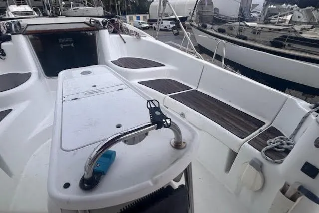 Slide: The Image of 2007 Jeanneau Sun Odyssey 42 DS sailboat cockpit with seating and table. - 33