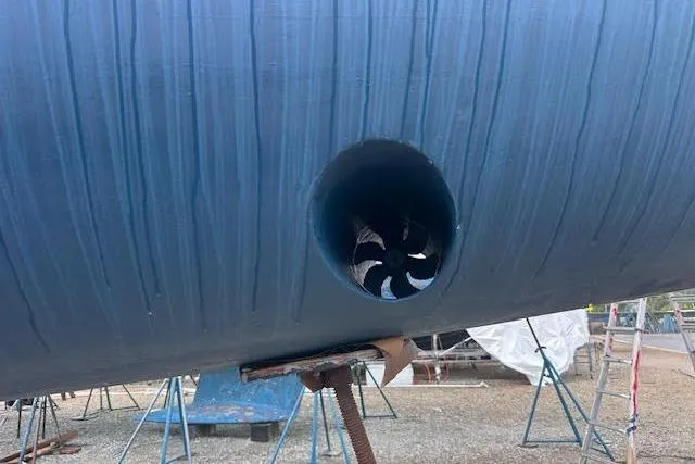 Slide: The Image of Hull of 2007 Jeanneau Sun Odyssey 42 DS with bow thruster in dry dock. - 36