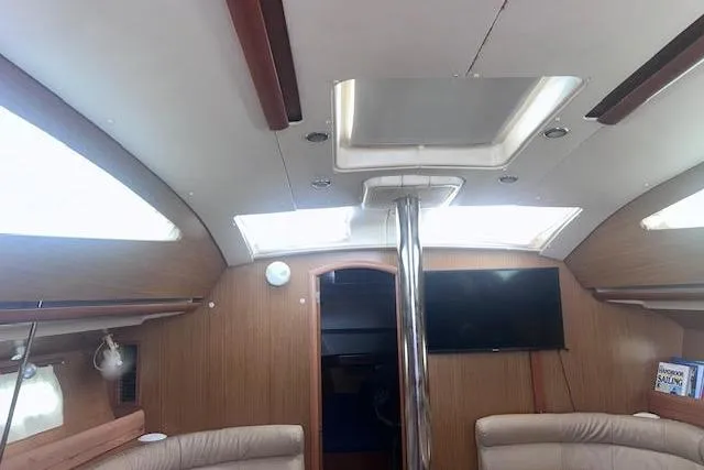 Slide: The Image of Interior of 2007 Jeanneau Sun Odyssey 42 DS sailboat, featuring modern design and comfortable seating. - 45