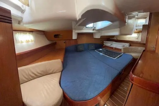 Slide: The Image of Interior cabin of 2007 Jeanneau Sun Odyssey 42 DS yacht with cozy seating and bed. - 49