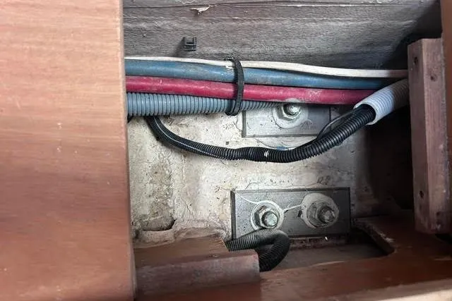 Slide: The Image of Interior wiring and bolts of a 2007 Jeanneau Sun Odyssey 42 DS sailboat. - 56