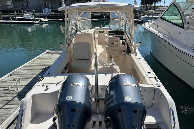 Slide: The Image of 2015 Grady-White Freedom 275 boat docked with twin Yamaha 200 engines. - 5