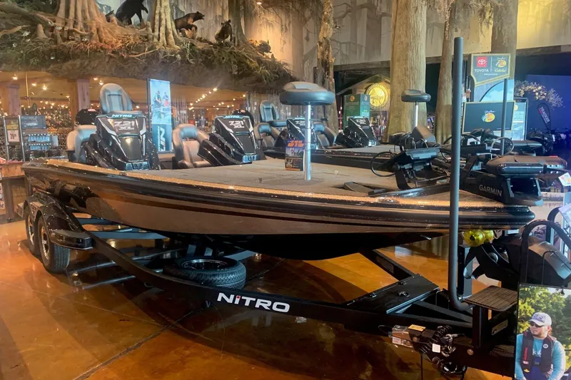 The Image of 2026 Nitro Z21 XL Pro boat displayed indoors with advanced fishing equipment. - 0