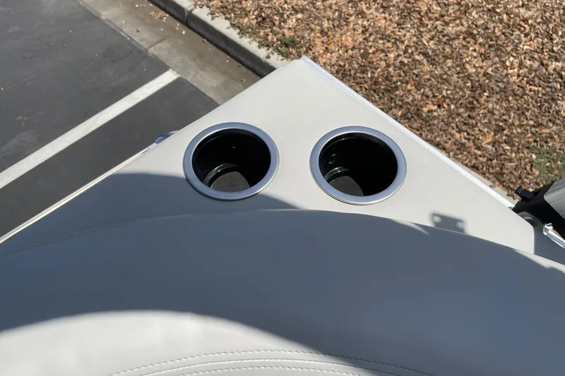 Slide: The Image of Cup holders on the 2026 Sun Tracker Bass Buggy 16 XL Select boat. - 22