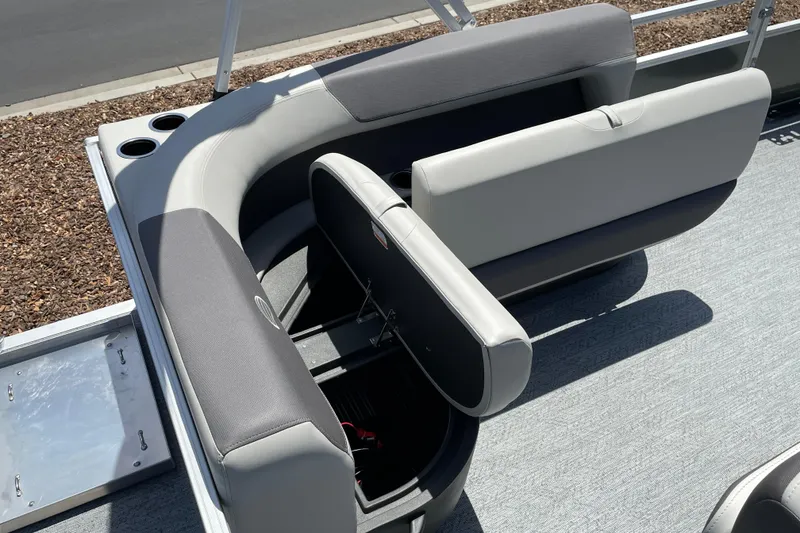 Slide: The Image of 2026 Sun Tracker Bass Buggy 16 XL Select pontoon boat seating and storage area. - 15