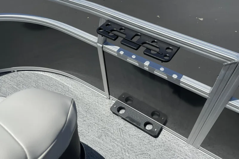 Slide: The Image of Sun Tracker Bass Buggy 16 XL Select 2026 boat interior with seating and railing details. - 18