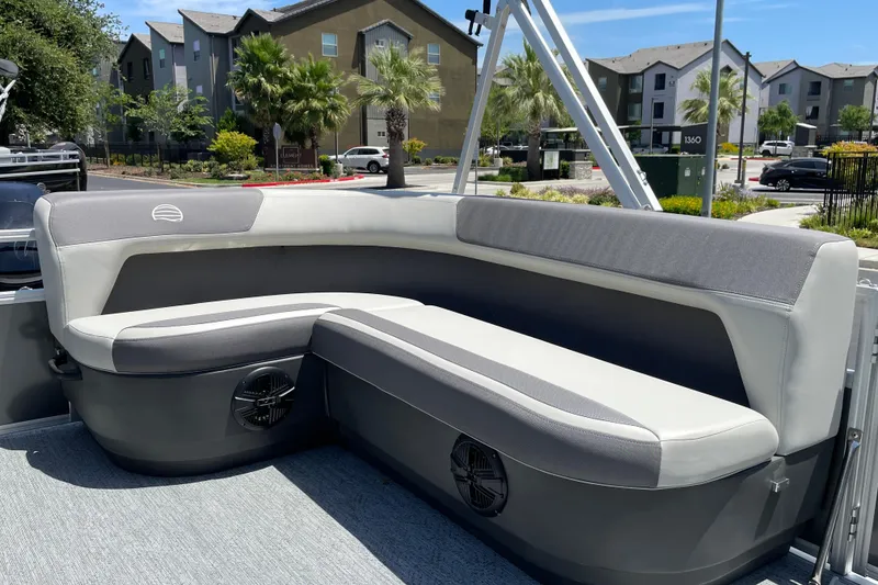 Slide: The Image of 2026 Sun Tracker Bass Buggy 16 XL Select pontoon boat with cushioned seating. - 26