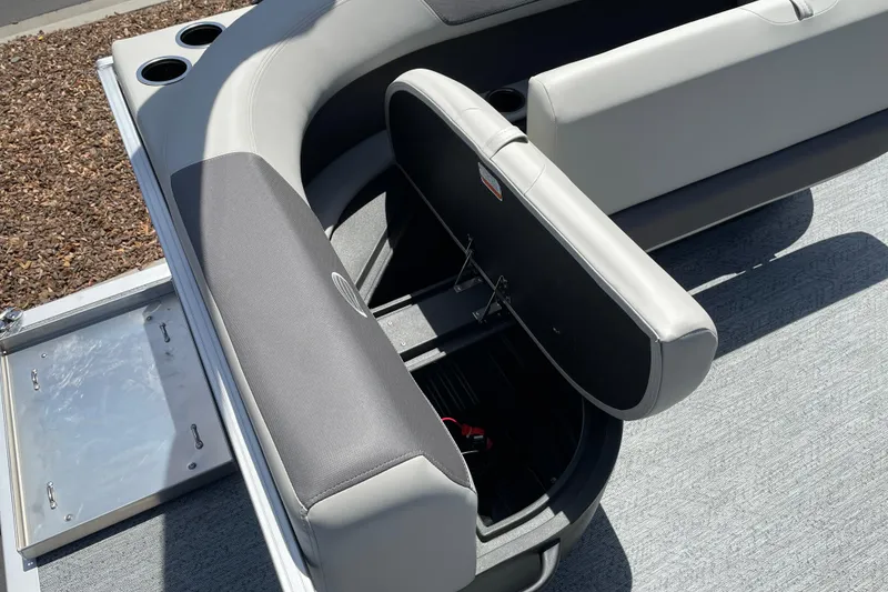 Slide: The Image of 2026 Sun Tracker Bass Buggy 16 XL Select boat seat with open storage compartment. - 14