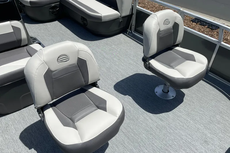 Slide: The Image of 2026 Sun Tracker Bass Buggy 16 XL Select boat seats, featuring gray and white upholstery. - 8