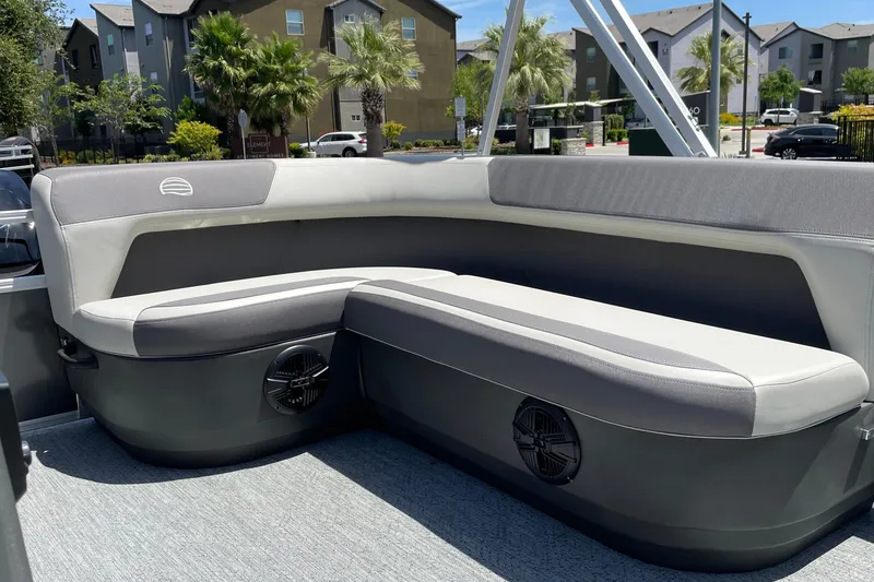 Slide: The Image of 2026 Sun Tracker Bass Buggy 16 XL Select pontoon boat with comfortable seating and modern design. - 24