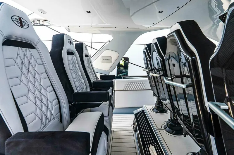 Slide: The Image of Luxurious interior seating of 2025 Cigarette 52' Thunder boat, featuring sleek design and premium materials. - 18