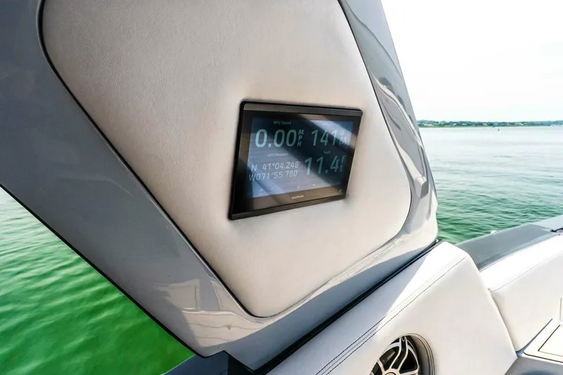 Slide: The Image of Display screen on 2025 Cigarette 52' Thunder boat showing GPS speed and coordinates. - 21