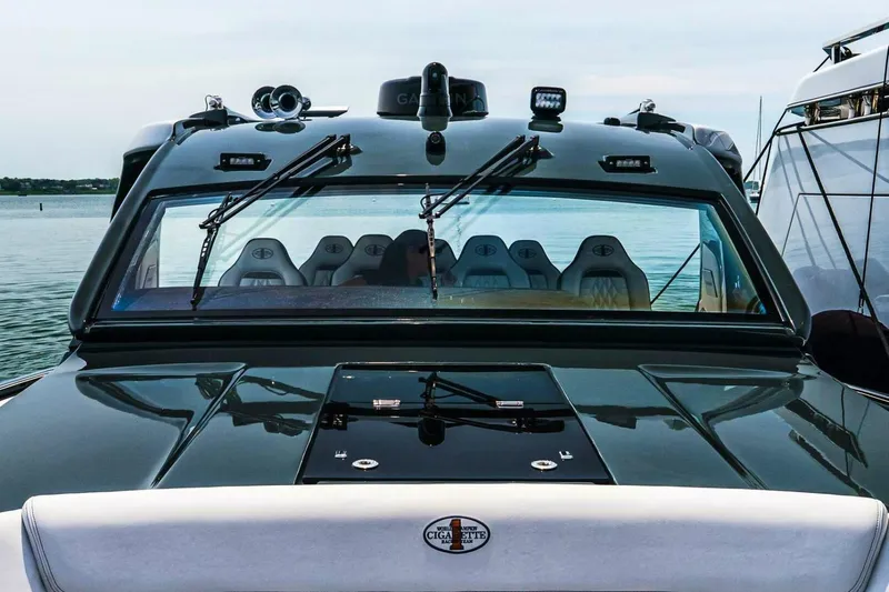 Slide: The Image of 2025 Cigarette 52' Thunder luxury boat on water, showcasing sleek design and advanced features. - 27