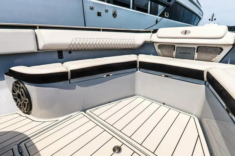 Slide: The Image of Luxurious seating area on 2025 Cigarette 52' Thunder boat with Garmin system. - 28
