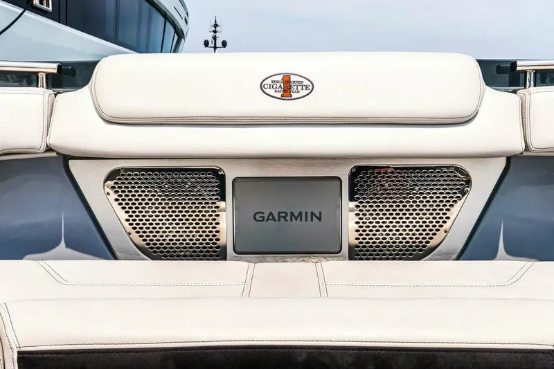 Slide: The Image of 2025 Cigarette 52' Thunder boat interior with Garmin technology and luxury seating. - 29