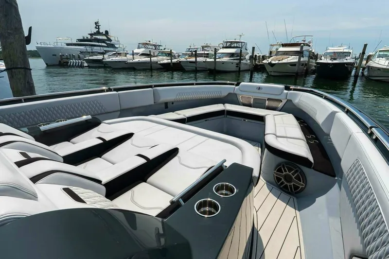Slide: The Image of Luxurious 2025 Cigarette 52' Thunder yacht interior with plush seating and sleek design. - 35