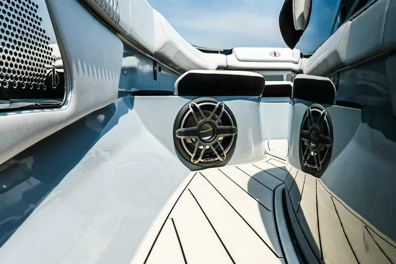 Slide: The Image of 2025 Cigarette 52' Thunder boat interior with sleek design and premium audio system. - 37