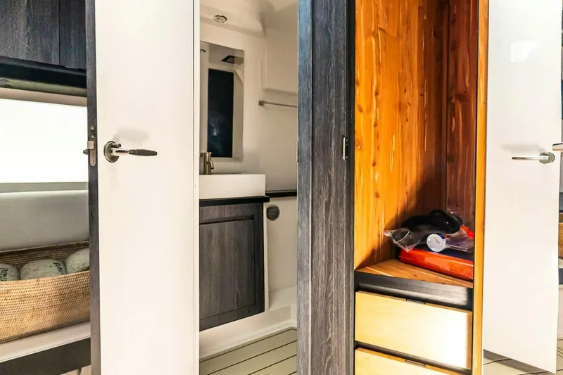 Slide: The Image of Interior of 2025 Cigarette 52' Thunder yacht featuring modern cabinetry and storage. - 40