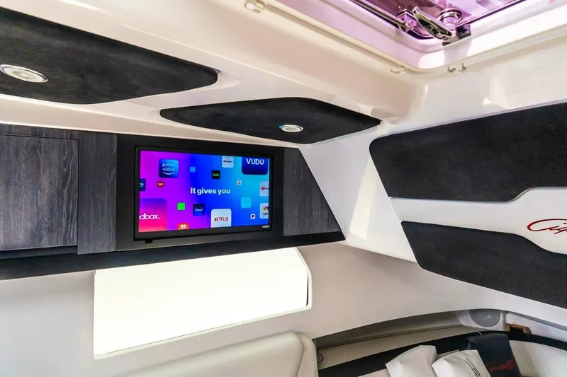 Slide: The Image of Interior of 2025 Cigarette 52' Thunder boat with modern entertainment system. - 41