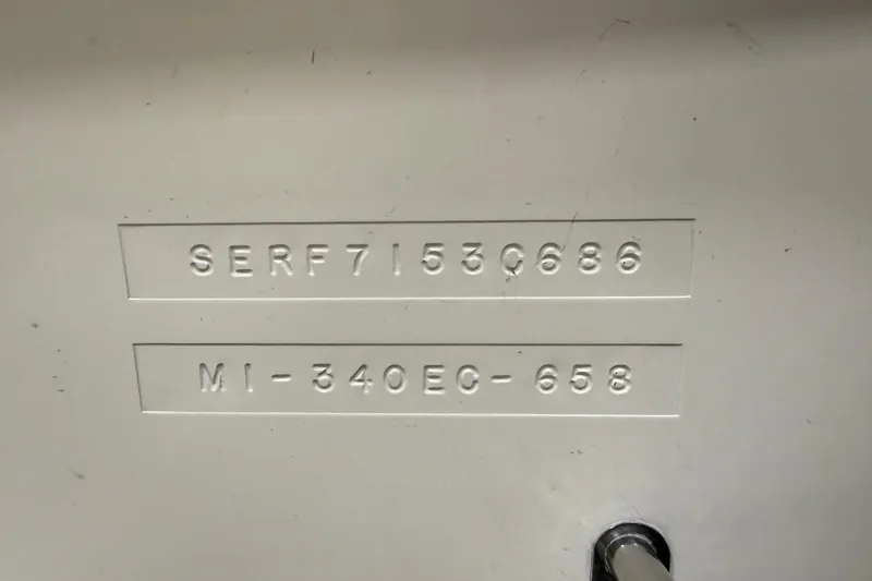 Slide: The Image of 1986 Sea Ray 340 Express Cruiser hull identification number and model code. - 3