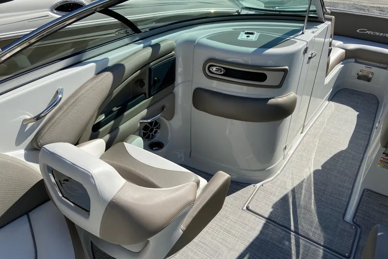 Slide: The Image of 2021 Crownline Eclipse E235 XS boat interior with modern seating and sleek design. - 11