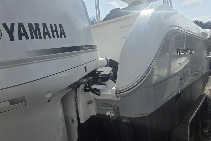 Slide: The Image of 2019 World Cat 295 CC boat with Yamaha four-stroke engine, side view. - 29