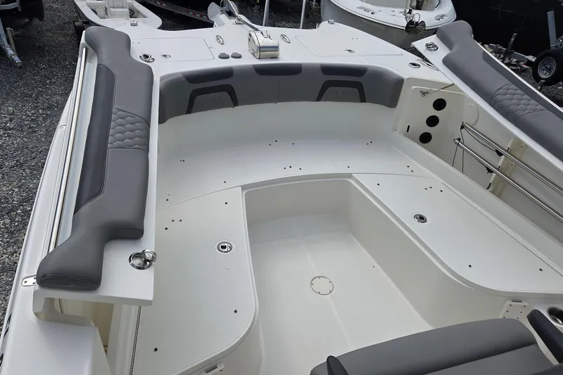 Slide: The Image of 2019 World Cat 295 CC boat interior with spacious seating and modern design. - 3