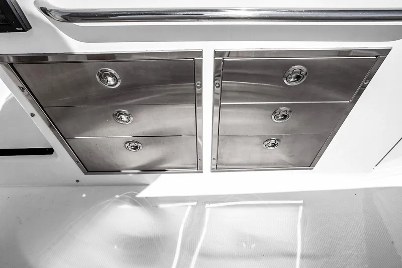 Slide: The Image of Stainless steel storage drawers on 2025 Grady-White Canyon 456 boat. - 27
